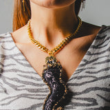 Body necklace with cascading chains - in gold-colored steel