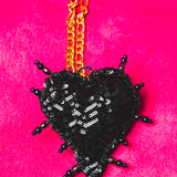 Collana 100% Handmade con cuore ricamato a mano nero in paillettes con occhio centrale, catena in acciaio inossidabile oro