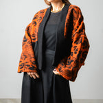 NATALINA - Giacca corta sartoriale in lana arancione con nere "teddy"